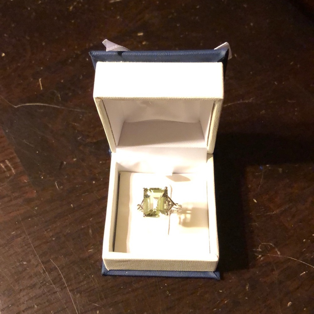 Peridot and white topaz lab created ring